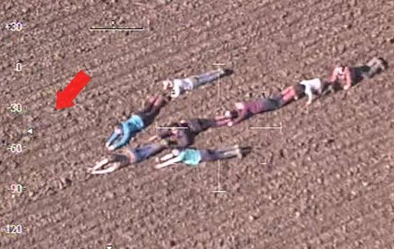Children form human arrow – help police helicopter catch suspects.